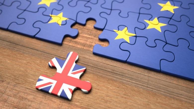United Kingdom leaving the European Unio<em></em>n represented in puzzle pieces.