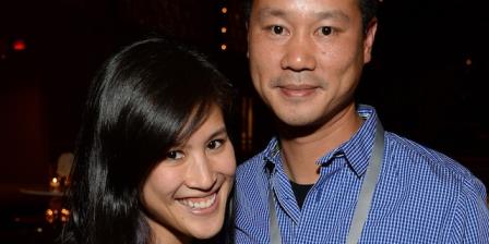 SAN FRANCISCO, CA - OCTOBER 08: Mimi Pham and Zappos.com CEO Tony Hsieh attend the Vanity Fair New Establishment Summit Cockatil Party on October 8, 2014 in San Francisco, California. (Photo by Michael Kovac/Getty Images for Vanity Fair)