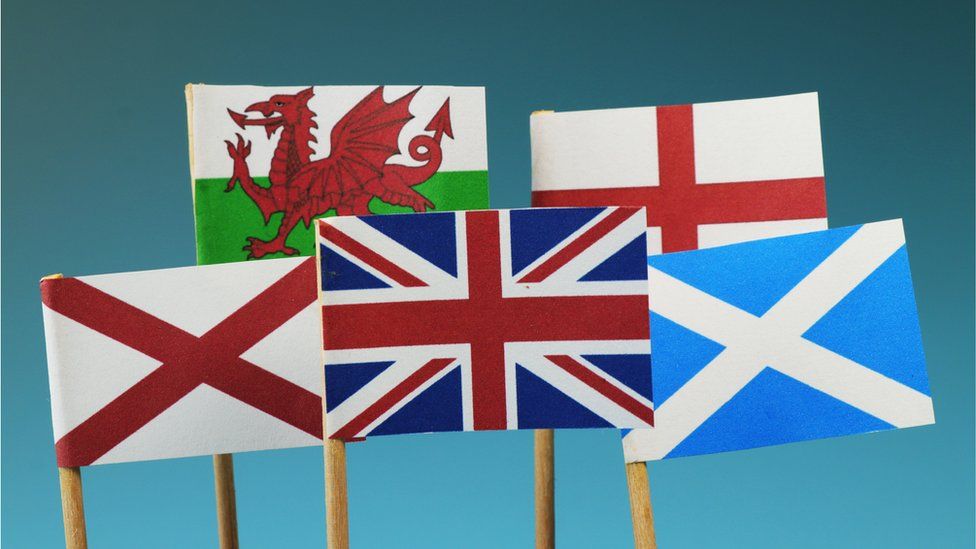A United kingdom flag and their members as Scotland, England, Northern Ireland, Wales - stock photo