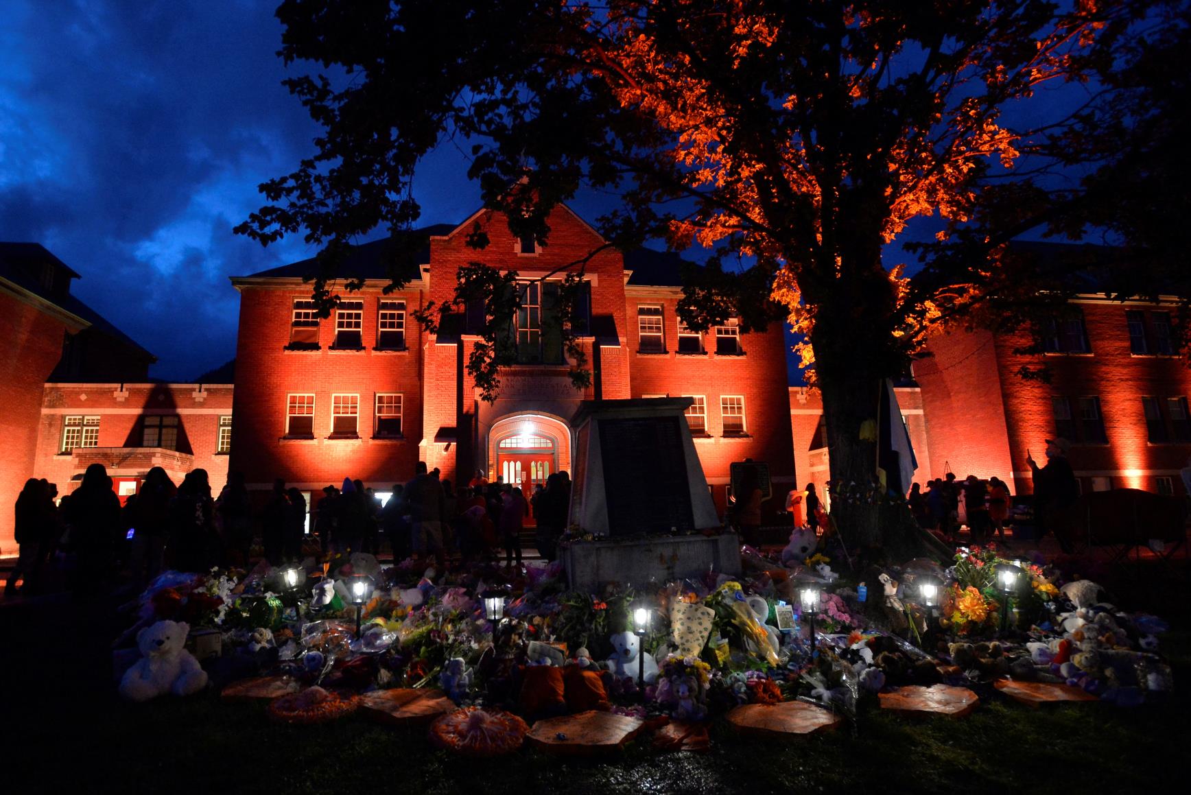 A makeshift memorial grows on the grounds of the former Kamloops Indian Residential School after the remains of 215 children, some as young as three years old, were found at the site in Kamloops, British Columbia, Canada June 5, 2021.  REUTERS/Jennifer Gauthier