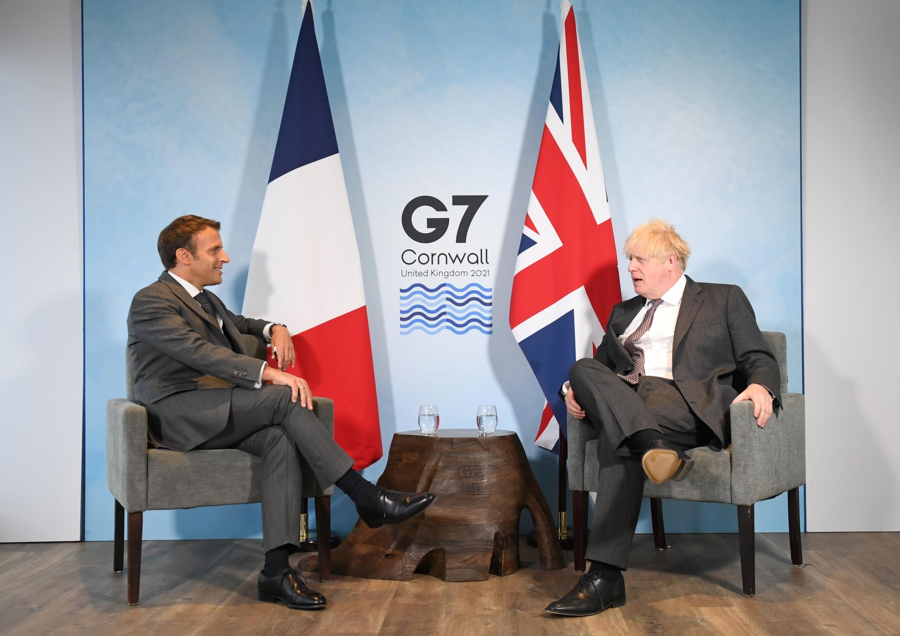 Britain's Prime Minister Boris Johnson and France's President Emmanuel Macron attend a bilateral meeting during G7 summit in Carbis Bay, Cornwall, Britain, June 12, 2021. Stefan Rousseau/Pool via REUTERS