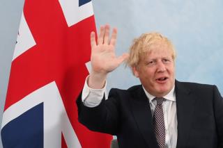 Britain's Prime Minister Boris Johnson waves during a meeting with U.S. President Joe Biden (not pictured) ahead of the G7 summit, at Carbis Bay, Cornwall, Britain June 10, 2021. REUTERS/Toby Melville/Pool