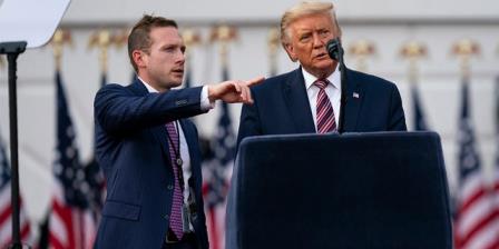 Former President Do<em></em>nald Trump talks with former Deputy Campaign Manager for Presidential Operations Max Miller, left before his speech to the Republican Natio<em></em>nal Co<em></em>nvention on the South Lawn of the White House, Thursday, Aug. 27, 2020, in Washington. Miller is now running for Co<em></em>ngress against Rep. Anthony Gonzalez, R-Ohio, who voted to impeach Trump. (AP Photo/Evan Vucci)