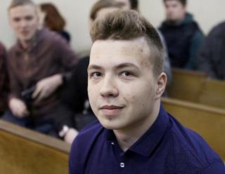 Opposition blogger and activist Roman Protasevich, who is accused of participating in an unsanctio<em></em>ned protest at the Kuropaty preserve, waits before the beginning of a court hearing in Minsk, Belarus April 10, 2017.  REUTERS/Stringer/File Photo