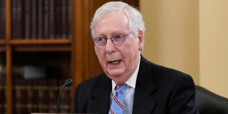 Senate Minority Leader Mitch McConnell, R-Ky., speaks at a Senate Rules Committee markup to argue against the For the People Act, which would expand access to voting and other voting reforms, at the Capitol in Washington, Tuesday, May 11, 2021. In remarks in Kentucky on Tuesday, McCo<em></em>nnell said defunding police is "one of the dumbest ideas" in American history. (AP Photo/J. Scott Applewhite)