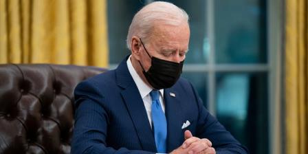President Joe Biden looks down as he talks a<em></em>bout the FBI agents killed in Sunrise, Fla., during an event on immigration in the Oval Office of the White House, Tuesday, Feb. 2, 2021, in Washington. The FBI later sought information on readers of a USA TODAY story a<em></em>bout the same shooting.  (AP Photo/Evan Vucci)