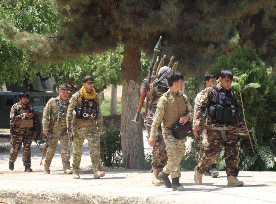Afghan security forces are seen at the site of a battle field wher<em></em>e they clash with the Taliban insurgent in Kunduz province, Afghanistan June 22, 2021. REUTERS/Stringer 