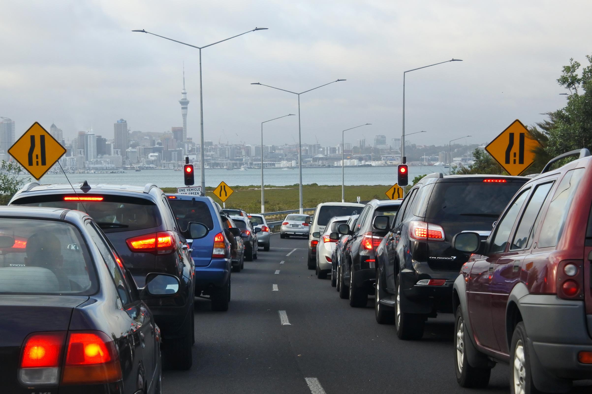 traffic jam on Auckland motorway with city in background