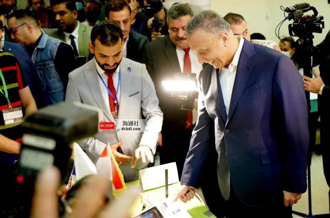 Iraqi Prime Minister Mustafa al-Kadhimi casts his vote at the polling station in the Green Zone, as Iraqis go to the polls to vote in the parliamentary election, Baghdad, Iraq, Oct. 10, 2021. (Iraqi Prime Minister Media Office via Reuters)