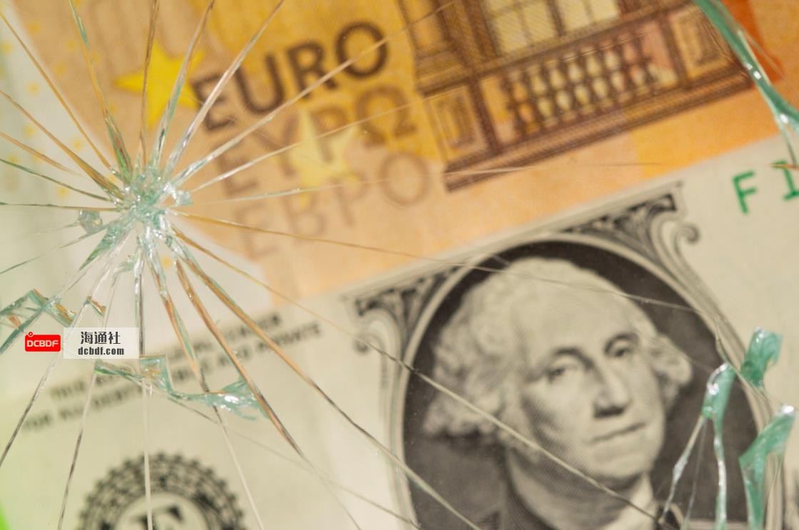 U.S. dollar and euro banknotes are seen through broken glass in this illustration taken, June 25, 2021. (Reuters Photo)