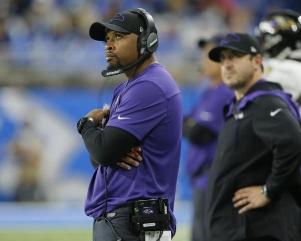 Baltimore Ravens special teams coach Chris Horton watches during the second half of an NFL football game against the Detroit Lions in Detroit, on Sept. 26, 2021. The 37-year-old Horton, a former NFL safety, just finished his third season in charge of Baltimore's special teams.