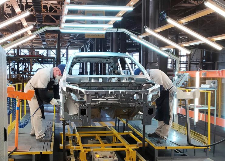 Employees work at the assembly line of the LADA Izhevsk automobile plant, part of the Avtovaz Group, in Izhevsk, Russia, last month.  